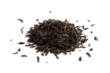 Dry black tea leaves, isolated on white background