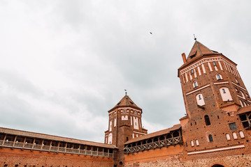 Obraz premium ancient castle, brick walls of the old castle, historical building