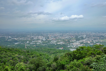 Fototapeta premium Beautiful Cityscape View of Chiang mai city on Doi Suthep Mountain in day time at chiang mai City Thailand