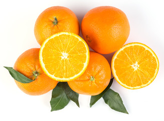 Top view of orange with green leaf on white background