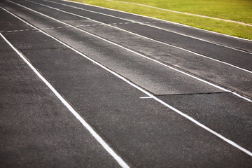 Straight black Running Track  on the athletics stadium.