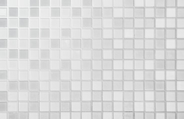 White or gray ceramic wall and floor tiles abstract background.