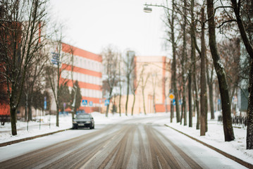 frosty winter morning, snowy empty street, winter city without people