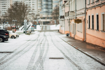 frosty winter morning, snowy empty street, winter city without people