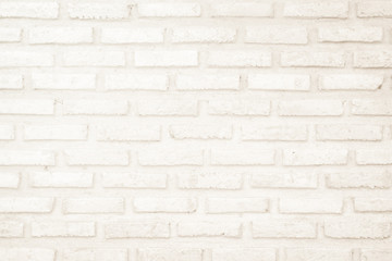 Cream and white brick wall texture background. Brickwork or stonework flooring interior rock old pattern clean concrete grid uneven bricks design stack.