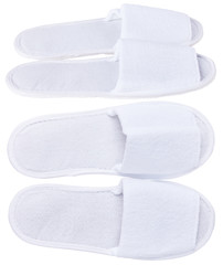 Pair of blank white home slippers. Top and bottom view. Bed shoes accessory footwear. Spa, hotel,...
