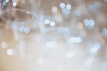 Stylish light background. Blurred glasses with bokeh