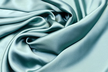 Fototapeta na wymiar Silk, fabric satin gray-green color