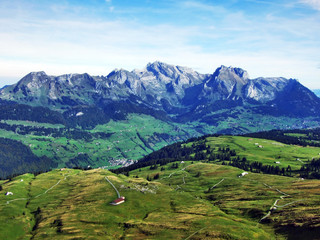 Autumn pastures and hills on the plateau beneath the mountain ranges Churfirsten - Canton of St....