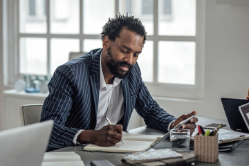 Businessman Taking Notes