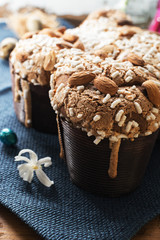 Colomba - italian easter dove cake on old rustic  board. Selective focus, free text space.