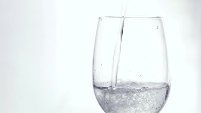 Soda water in a glass on a white background large plan