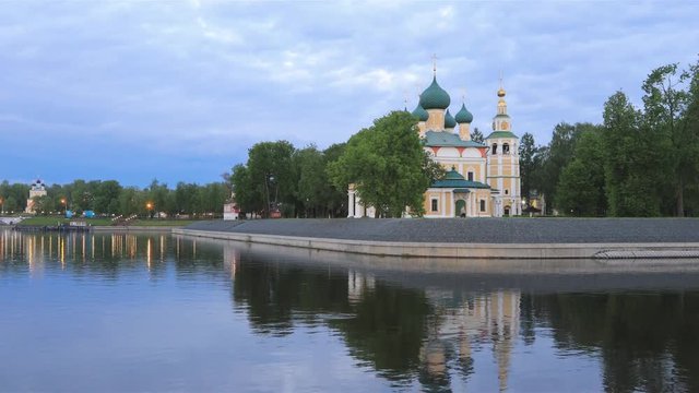 Uglich, Russia. View of Church of  Transfiguration reflecting in Volga river in the evening
