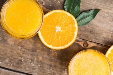 Top view of fresh oranges and orange juice