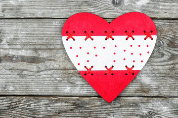 Valentine's Day. red heart on the background of old boards