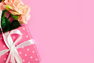 Greeting card on pink background. Selective focus. Valentines day, Womens day, Mothers day. Background with copy space. Horizontal.