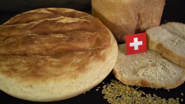 Bread with flag of Switzerland. World wheat import export trade