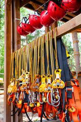 Self belay safety equipment at a ropes course in a treetop adventure park