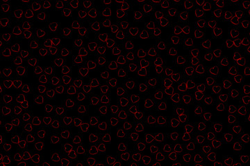 Valentine's Day abstract 3D illustration pattern with black hearts on dark background surrounded by red glow.