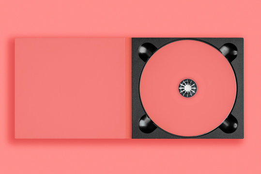 pastel pink cd in case on pastel pink background.
