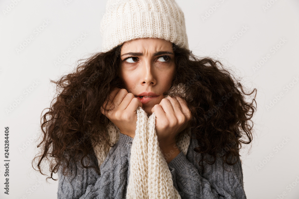 Sticker upset young woman wearing winter scarf