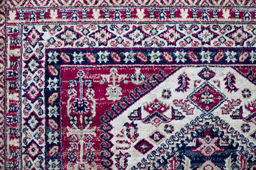 Background in the form of a piece of old eastern carpet