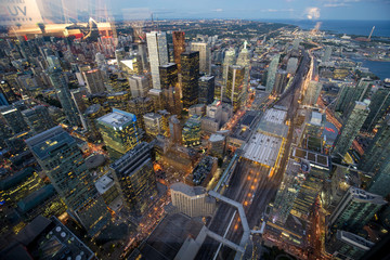 Naklejka na ściany i meble Dusk time view of Toronto downton from the CN tower.