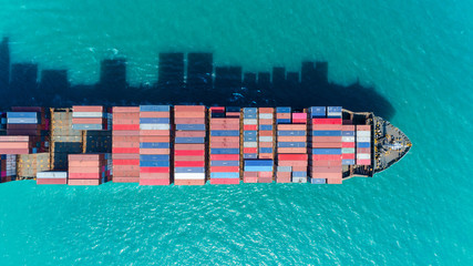 Aerial top view container ship full load container for logistics ,import export, shipping or transportation.