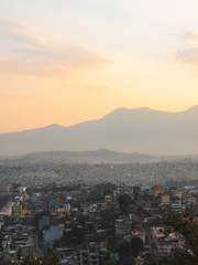 Fototapeta na wymiar Layer of buildings and mountains at Kathmandu sunset view.
