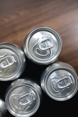 Cans of sweet drinks (or beer) soda cans