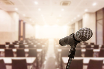 Microphone over the blurred business forum Meeting or Conference Training Learning Coaching Room...