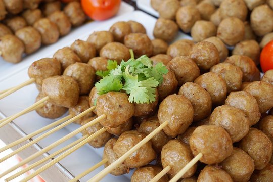 Grilled Thai style meatball skewers. Thailand popular street food.
