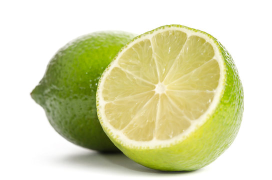 lime and  half of lime isolated on white background