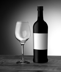 a bottle of wine with an empty glass
