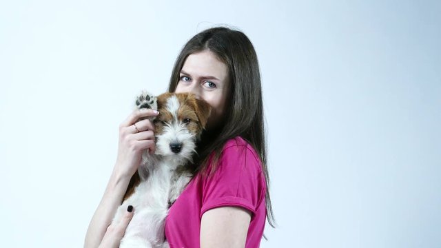 Woman close up portrait woth her puppy
