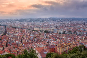 Fototapeta na wymiar Panoramic aerial view of Nice, amazing aerial cityscape, view at sunset from popular viewpoint on the Castle Hill, French Riviera, Cote d’Azur, France
