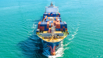 Container ship in export and import business logistics and transportation. Cargo and container box...