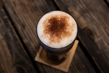 Chocolate smoothie, Cocoa drink, chocolate cocktail. On a wooden background.