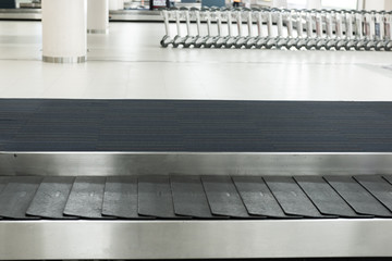 conveyor belt in arrivals lounge of airport termina