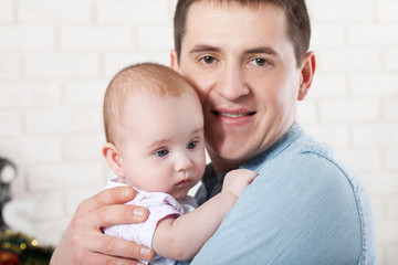 family, parenthood and people concept - father with little baby