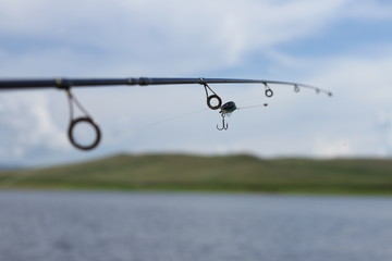 fishing rod on the background of nature