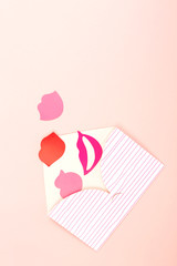 Envelope on pink background
