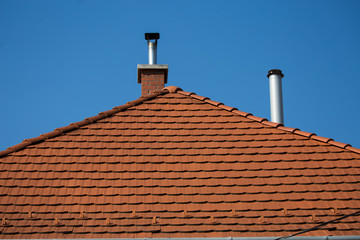 Naklejka premium red roof and chimney