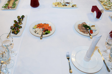 Festive table with food and drinks. A luxurious reception for guests.