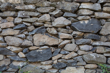old stone wall of stones