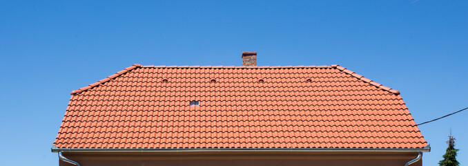 red roof of a house © Orosz György Photogr