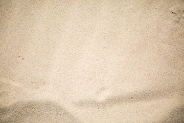 Close up of sandy sea shore. Sand structure.