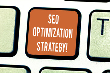 Writing note showing Seo Optimization Strategy. Business photo showcasing process of organizing a website s is content Keyboard key Intention to create computer message pressing keypad idea