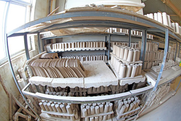 Ceramic unpainted clay idol in production workshop