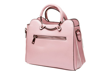 elegant pink female bag with metal fittings, on a white background